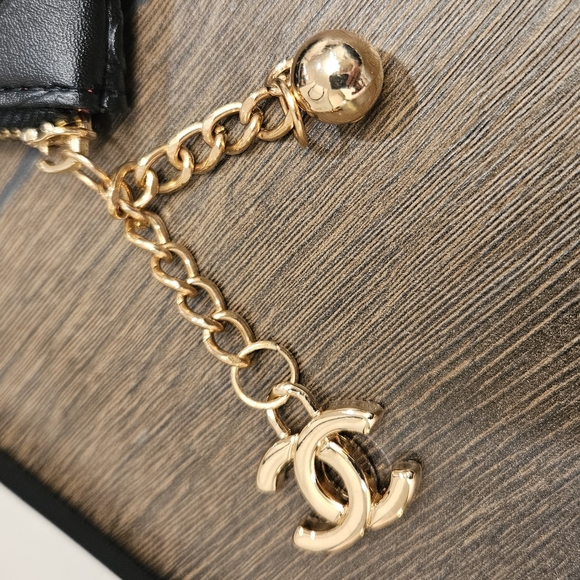 Black PVC Embossed Floral Zipper Pouch + Bag - Picture 12 of 12